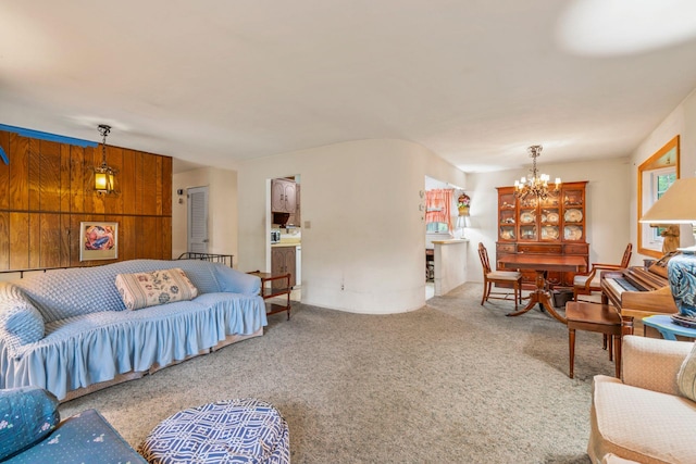 12 Ursular Ct, Smithtown, NY 11787 - carpeted living area with a chandelier