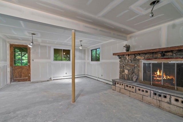 12 Ursular Ct, Smithtown, NY 11787 - unfurnished living room featuring unfinished concrete floors and a stone fireplace