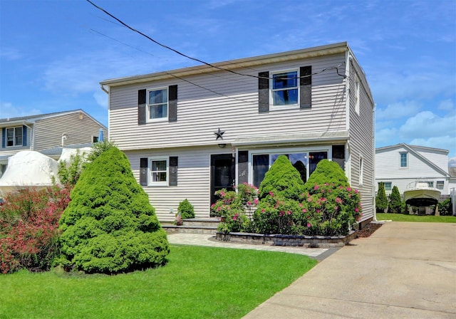 674 Shore Rd, Lindenhurst, NY 11757 - view of front of property with a front lawn