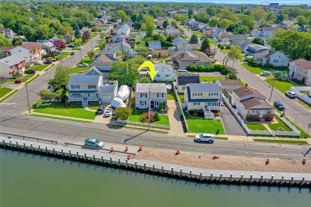 674 Shore Rd, Lindenhurst, NY 11757 - aerial perspective of suburban area with a large body of water