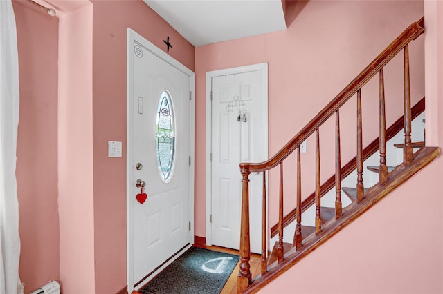 674 Shore Rd, Lindenhurst, NY 11757 - foyer entrance with stairs and baseboard heating