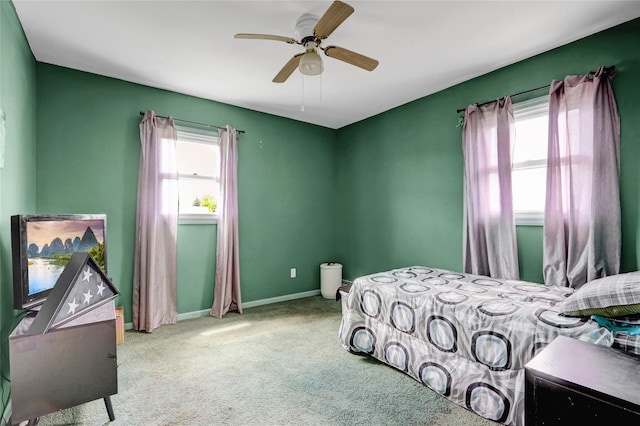 674 Shore Rd, Lindenhurst, NY 11757 - bedroom featuring carpet, baseboards, and ceiling fan