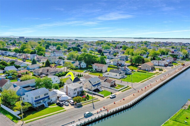 674 Shore Rd, Lindenhurst, NY 11757 - aerial view of residential area featuring a large body of water