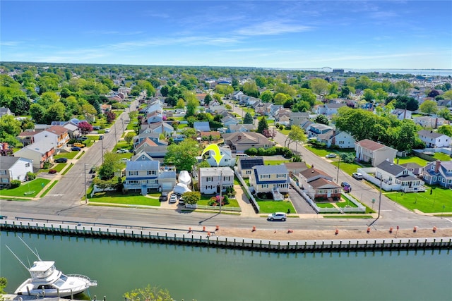 674 Shore Rd, Lindenhurst, NY 11757 - aerial perspective of suburban area with a large body of water