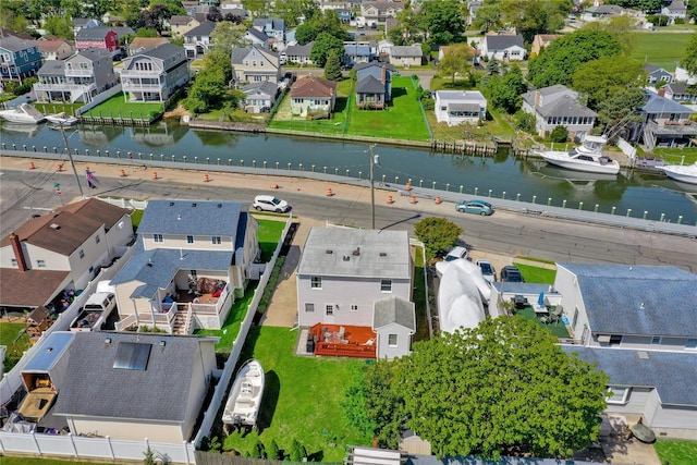 674 Shore Rd, Lindenhurst, NY 11757 - aerial perspective of suburban area featuring a nearby body of water