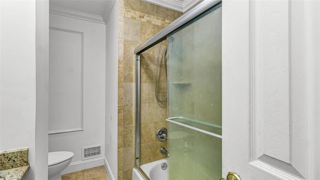 3123 Lydia Ln, Bellmore, NY 11710 - full bath featuring crown molding, bath / shower combo with glass door, and tile patterned flooring
