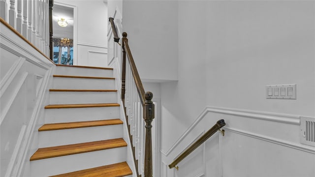 3123 Lydia Ln, Bellmore, NY 11710 - staircase with a decorative wall