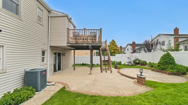 3123 Lydia Ln, Bellmore, NY 11710 - fenced backyard featuring a patio area, stairway, and a wooden deck