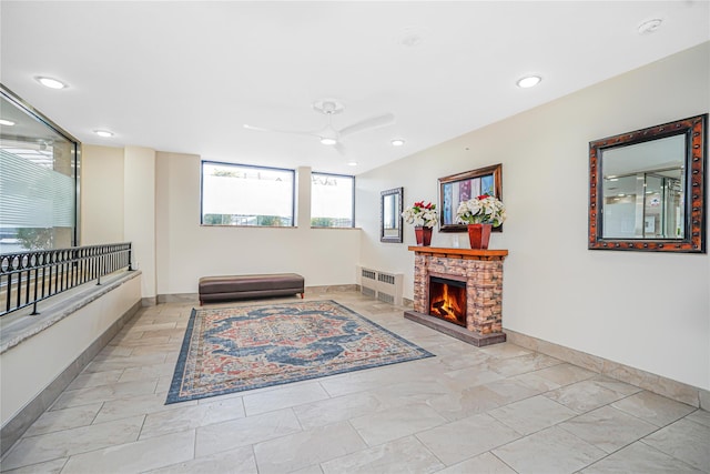 2121 Shore Pkwy Unit 2P, Brooklyn, NY 11214 - sitting room with radiator, ceiling fan, recessed lighting, baseboards, and a fireplace