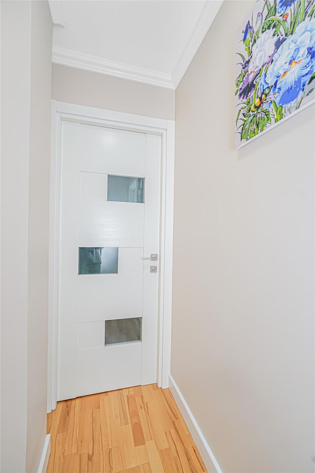 2121 Shore Pkwy Unit 2P, Brooklyn, NY 11214 - hallway featuring wood finished floors, crown molding, and baseboards