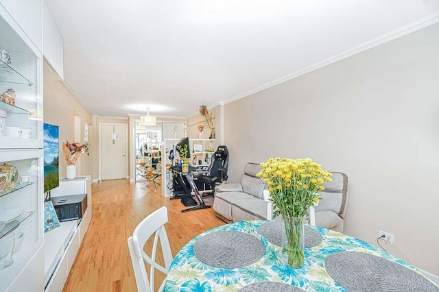 2121 Shore Pkwy Unit 2P, Brooklyn, NY 11214 - dining room with light wood-style floors and ornamental molding