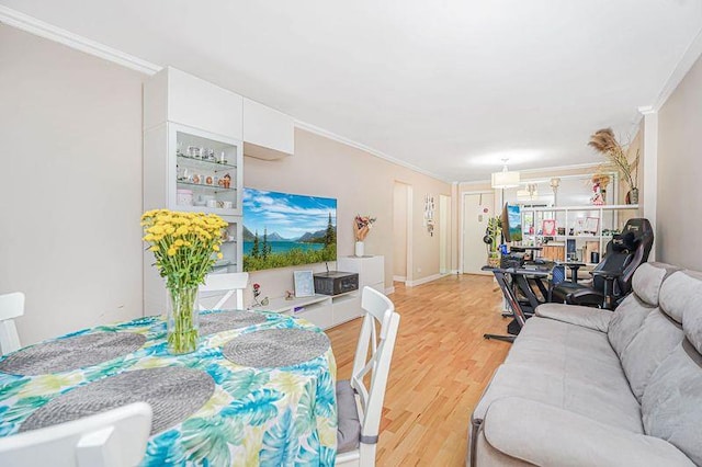 2121 Shore Pkwy Unit 2P, Brooklyn, NY 11214 - living area featuring crown molding and light wood-style flooring