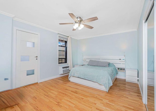 2121 Shore Pkwy Unit 2P, Brooklyn, NY 11214 - bedroom with light wood-style floors, ornamental molding, a wall unit AC, baseboards, and ceiling fan
