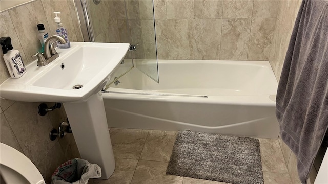 52-40 39th Dr Unit 9J, Woodside, NY 11377 - full bath featuring tile walls and shower / tub combo with curtain