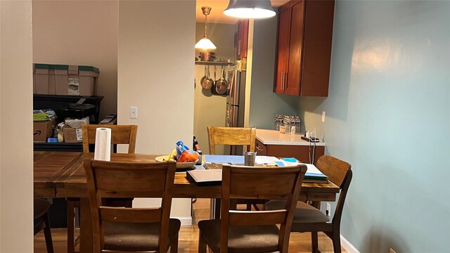 52-40 39th Dr Unit 9J, Woodside, NY 11377 - dining area featuring light wood-type flooring
