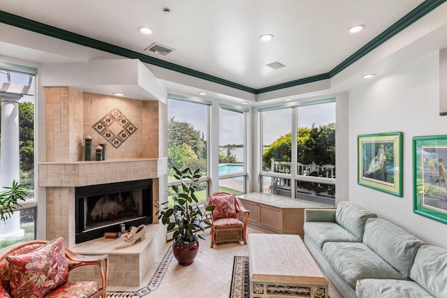 1416 Bay Blvd, Atlantic Beach, NY 11509 - living area featuring crown molding, recessed lighting, healthy amount of natural light, and a tile fireplace