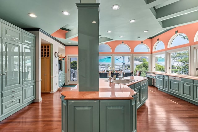 1416 Bay Blvd, Atlantic Beach, NY 11509 - kitchen featuring green cabinets, dark wood-type flooring, a center island with sink, light countertops, and recessed lighting