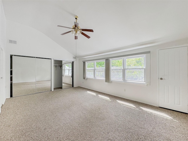 203 Dover Grn, Staten Island, NY 10312 - unfurnished bedroom with vaulted ceiling, carpet floors, two closets, a ceiling fan, and baseboards