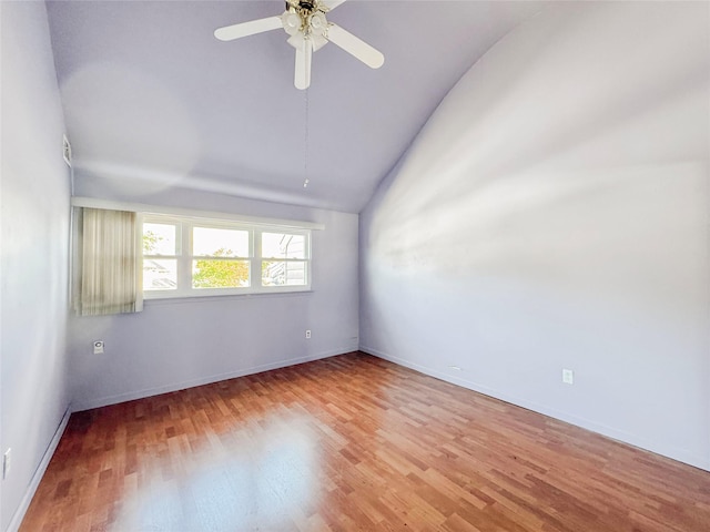 203 Dover Grn, Staten Island, NY 10312 - empty room featuring light wood-style floors, baseboards, ceiling fan, and high vaulted ceiling