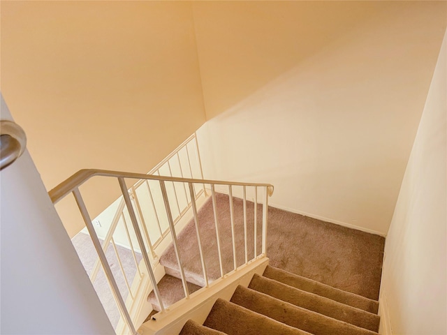 203 Dover Grn, Staten Island, NY 10312 - stairs featuring carpet flooring and baseboards
