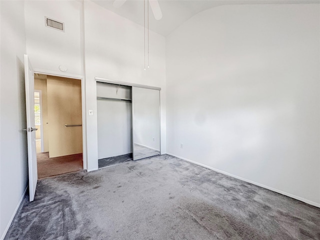 203 Dover Grn, Staten Island, NY 10312 - unfurnished bedroom with carpet floors, a closet, baseboards, high vaulted ceiling, and ceiling fan