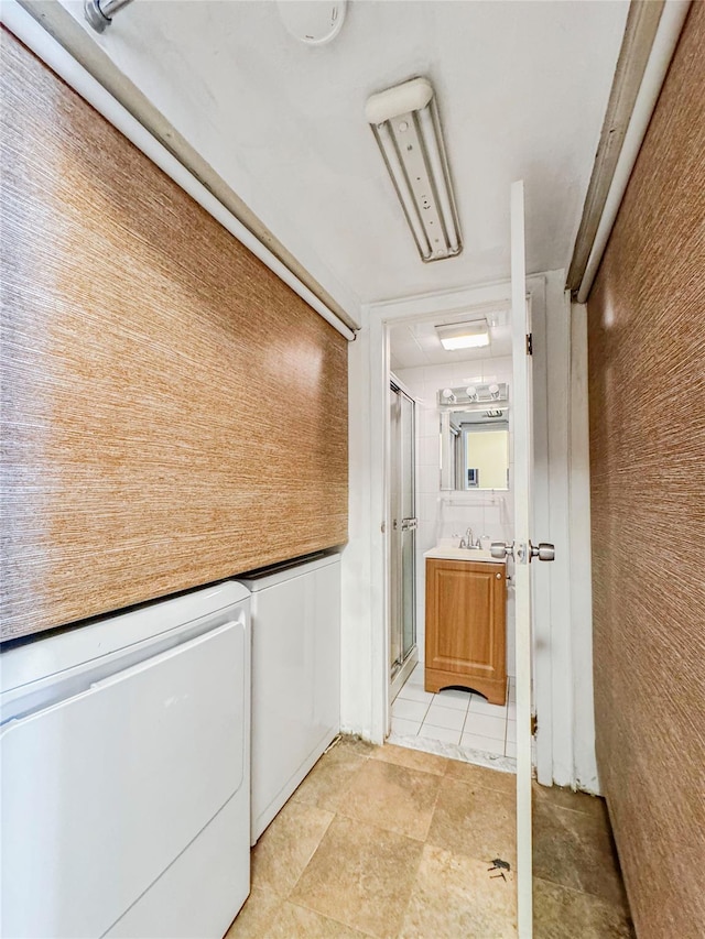 203 Dover Grn, Staten Island, NY 10312 - laundry area with separate washer and dryer and light tile patterned floors