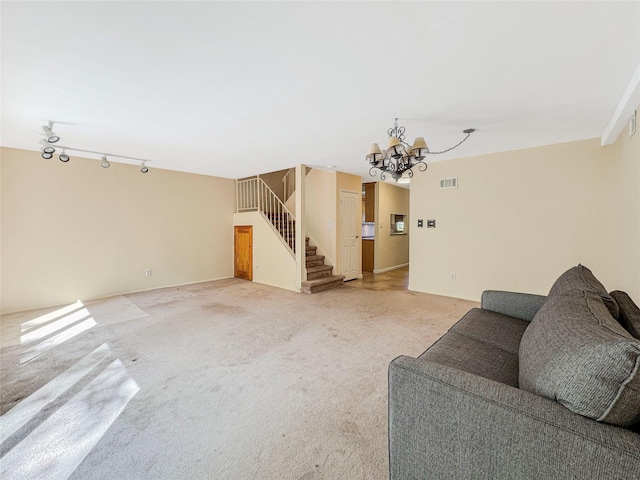 203 Dover Grn, Staten Island, NY 10312 - living area with stairway, a chandelier, light carpet, and rail lighting