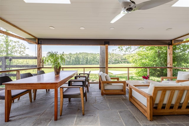 26 Roberson Ave, Pine Bush, NY 12566 - sunroom / solarium featuring outdoor dining space, an outdoor hangout area, a ceiling fan, and healthy amount of natural light