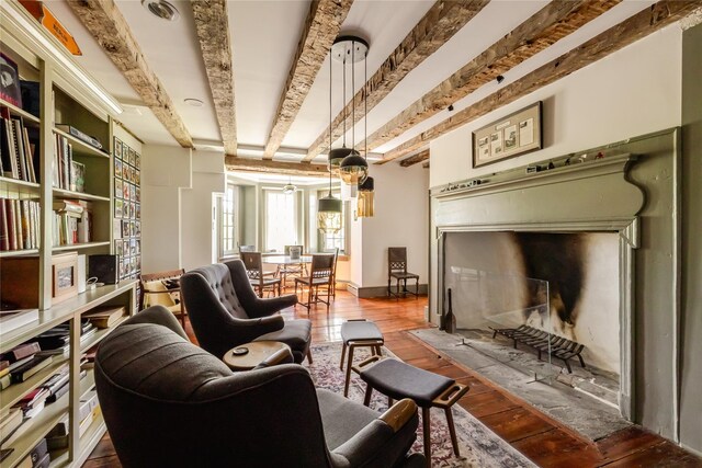 26 Roberson Ave, Pine Bush, NY 12566 - living area featuring hardwood / wood-style floors and beamed ceiling