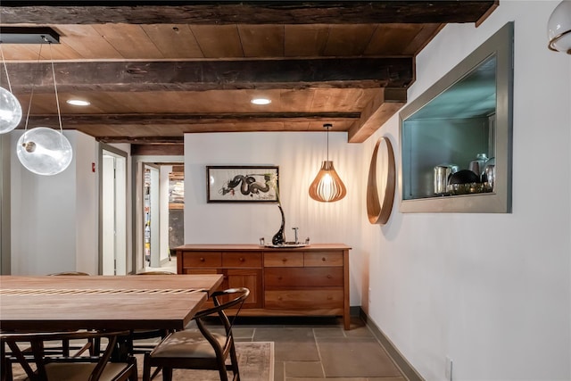 26 Roberson Ave, Pine Bush, NY 12566 - dining space featuring wooden ceiling with exposed beams and baseboards