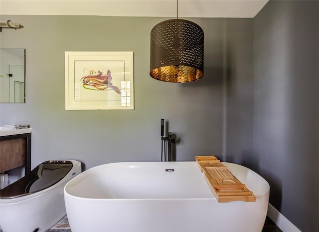 26 Roberson Ave, Pine Bush, NY 12566 - full bathroom with a soaking tub, vanity, and baseboards