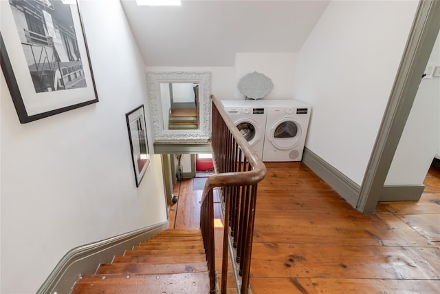 26 Roberson Ave, Pine Bush, NY 12566 - stairway with independent washer and dryer, wood-type flooring, and vaulted ceiling