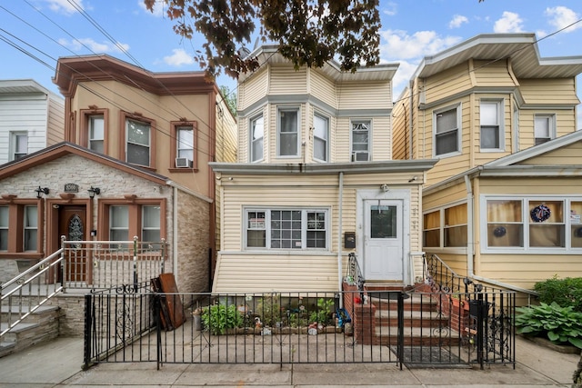 8564 79th St, Woodhaven, NY 11421 - multi unit property with a fenced front yard and entry steps