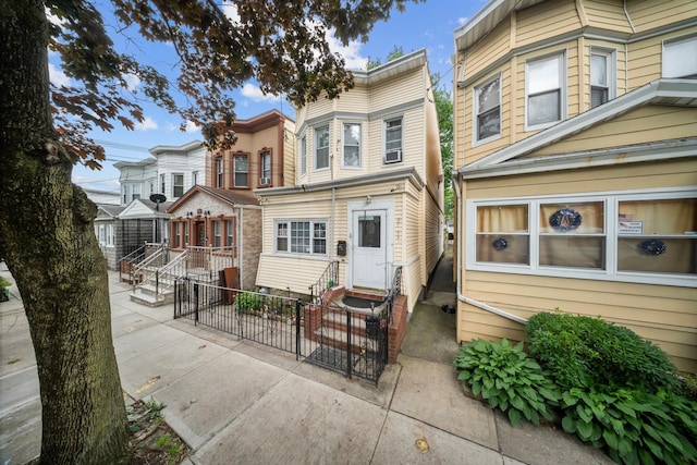 8564 79th St, Woodhaven, NY 11421 - back of house with entry steps and a patio area