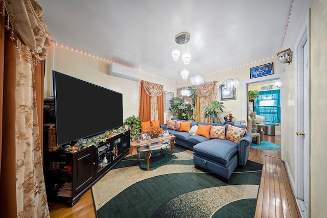 8564 79th St, Woodhaven, NY 11421 - living room featuring a wall mounted air conditioner and hardwood / wood-style floors
