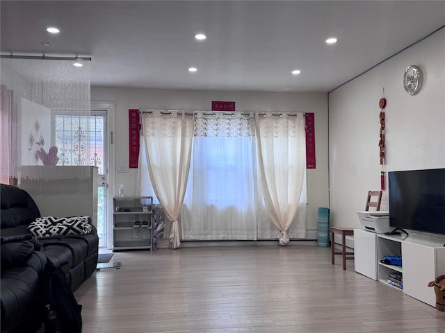 119-50 27th Ave, Flushing, NY 11354 - living area featuring wood finished floors and recessed lighting