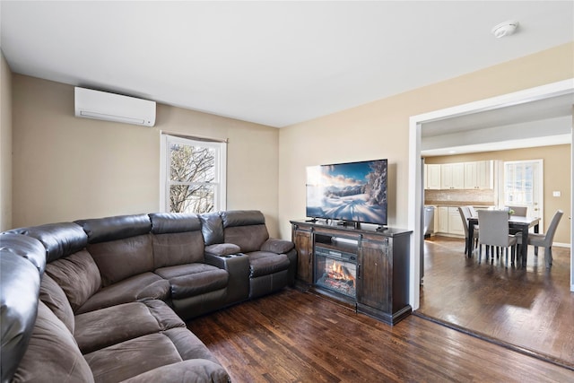 49 Anderson Ave, North Babylon, NY 11703 - living room featuring a wall mounted AC, dark wood finished floors, and plenty of natural light