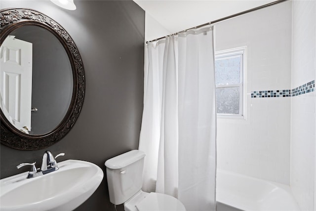 49 Anderson Ave, North Babylon, NY 11703 - full bathroom with a sink, shower / tub combo with curtain, and toilet
