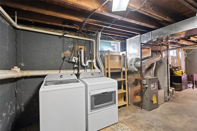 49 Anderson Ave, North Babylon, NY 11703 - basement with washer and dryer and water heater