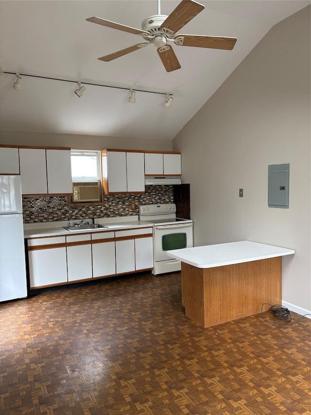 8 Sachs St, Bay Shore, NY 11706 - kitchen featuring track lighting, white appliances, under cabinet range hood, decorative backsplash, and light countertops