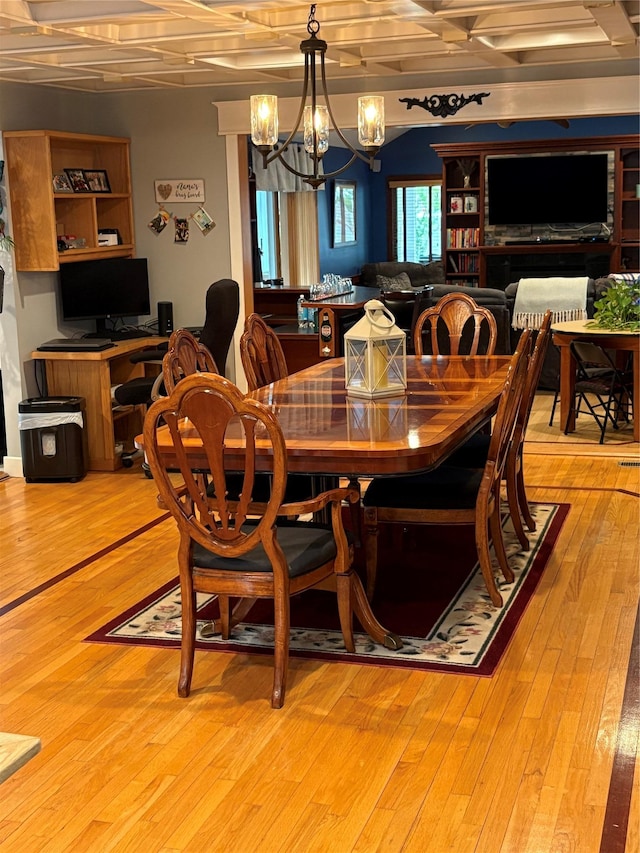 8 Sachs St, Bay Shore, NY 11706 - dining room with a chandelier and light wood-type flooring