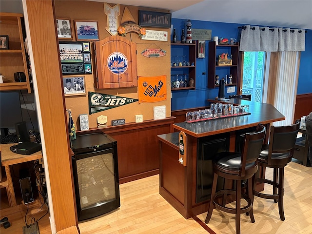 8 Sachs St, Bay Shore, NY 11706 - indoor dry bar with light wood-style floors and beverage cooler