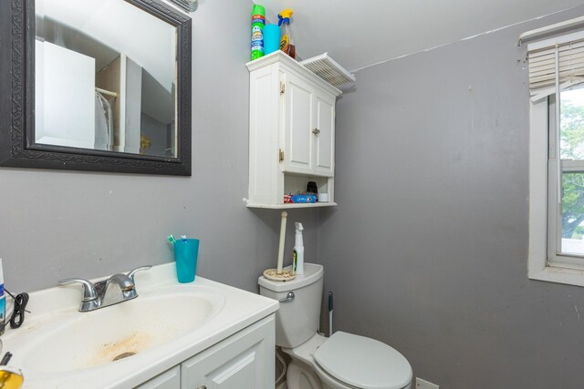 1340 Lombardy Blvd, Bay Shore, NY 11706 - full bathroom with toilet, vanity, and curtained shower