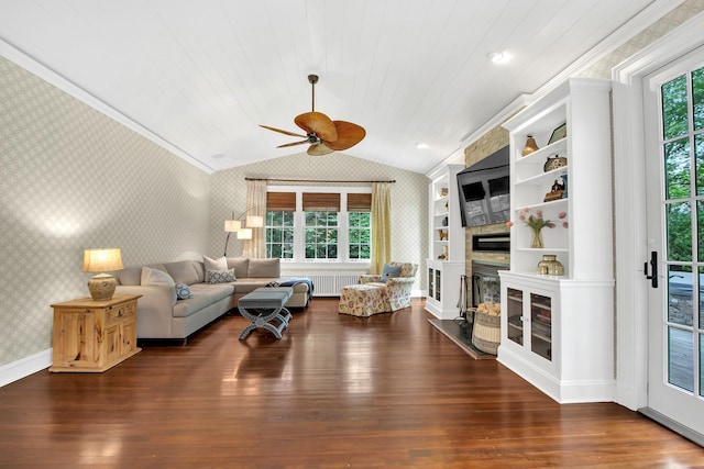 7 Middle Dr, Manhasset, NY 11030 - living room with wallpapered walls, vaulted ceiling, a ceiling fan, dark wood finished floors, and a large fireplace