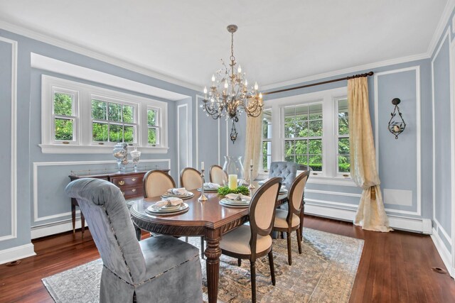 7 Middle Dr, Manhasset, NY 11030 - dining area with a chandelier, dark wood-style floors, healthy amount of natural light, a decorative wall, and crown molding