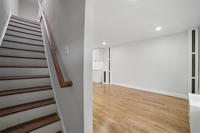 4163 Laconia Ave, Bronx, NY 10466 - stairway featuring wood finished floors, recessed lighting, and baseboards