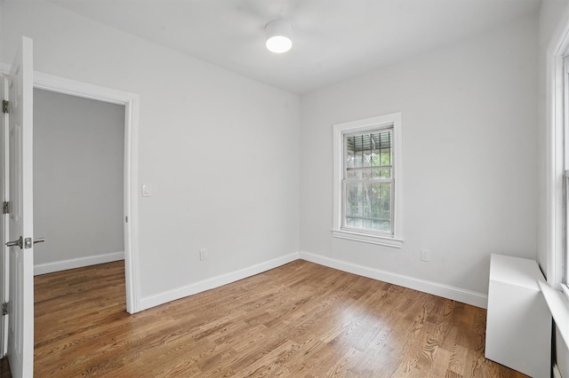 4163 Laconia Ave, Bronx, NY 10466 - spare room featuring wood finished floors and baseboards
