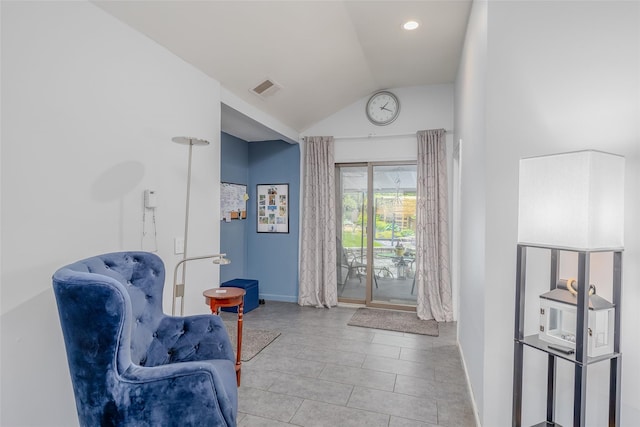 45 Broadview Dr, Commack, NY 11725 - living area with baseboards, lofted ceiling, and light tile patterned flooring
