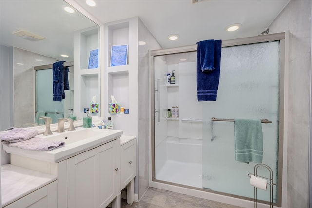 45 Broadview Dr, Commack, NY 11725 - bathroom featuring a shower stall, vanity, and recessed lighting