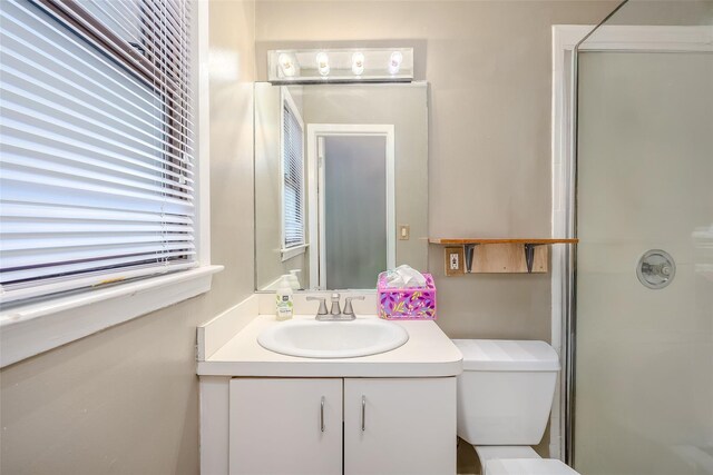 45 Broadview Dr, Commack, NY 11725 - full bathroom featuring vanity, a shower with shower door, and toilet